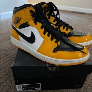 Air Jordan Mid 1 Taxi in Black, White, and Gold size 12